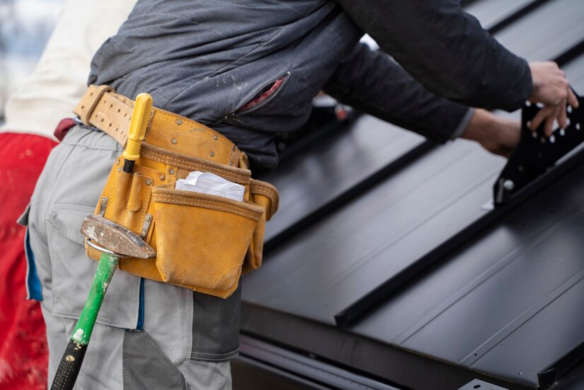 roofing repair experts fixing roof after winter