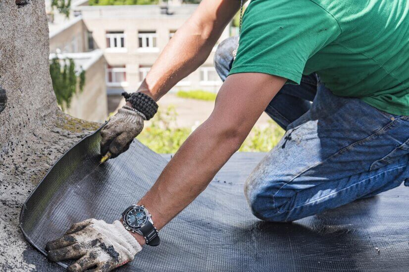 worker performs overhaul roof residential building in bay area
